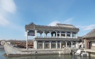 Decorative stone boat at Summer Palace, Beijing, with a clear blue sky in the background.