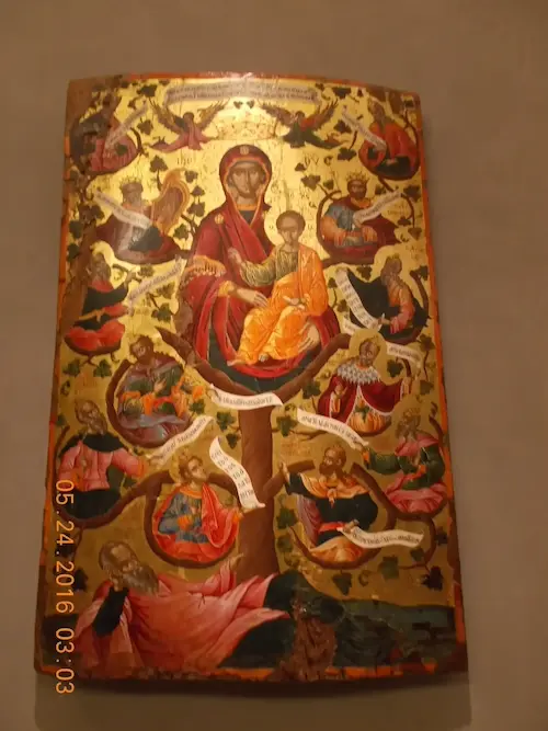 Religious icon painting depicting a tree of life with notable figures, dated 05-24-2016 at a museum exhibit.